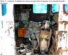 Contents of junked van where several vials of mercury were found, Durand, Michigan