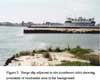 Barge slip adjacent to site (southwest side) showing proximity of residential area in far background