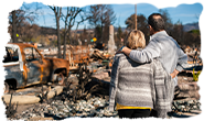 couple watching site of disaster