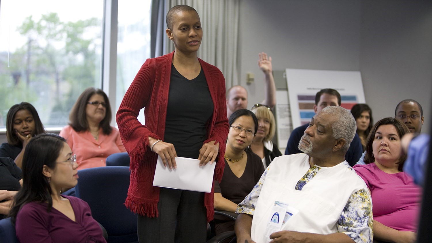 An African American woman attends a town hall meeting conducted on behalf of the ATSDR about local environmental issues. An African American woman attends a town hall meeting conducted on behalf of the ATSDR about local environmental issues.