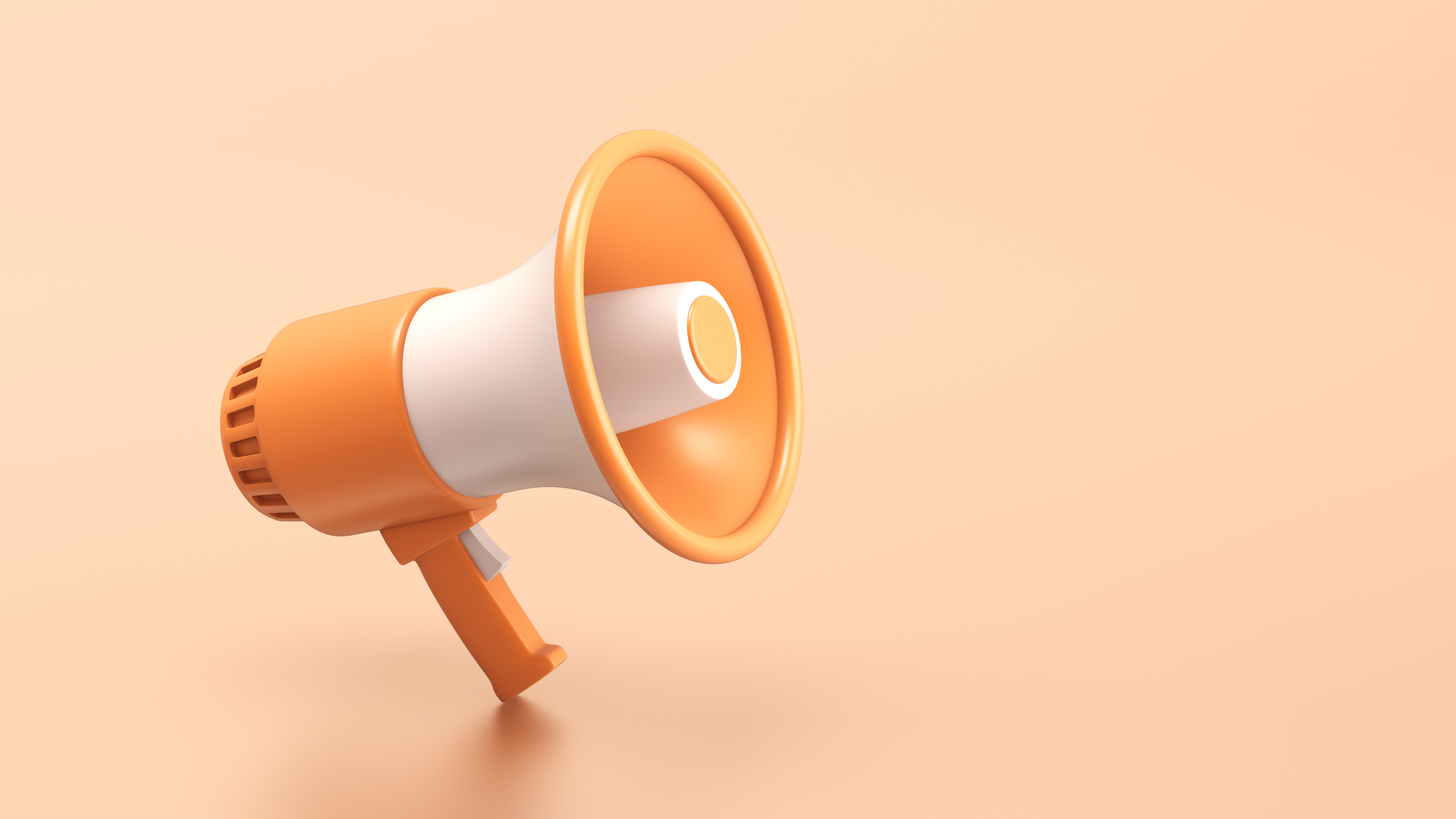 megaphone Single orange and white electric megaphone with a handle stands on a orange background
