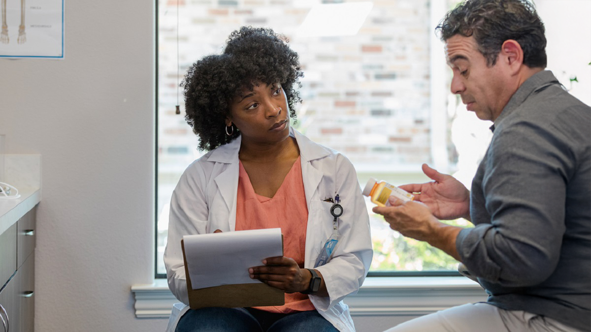 Doctor talking to patient