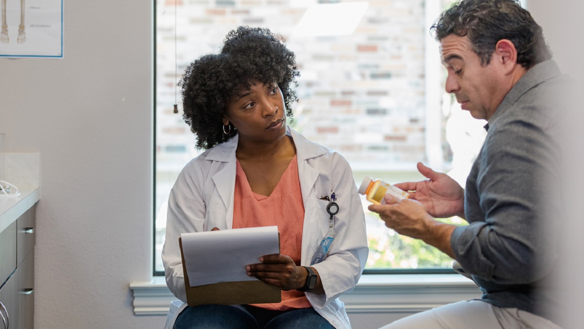Doctor talking to patient Doctor talking to patient