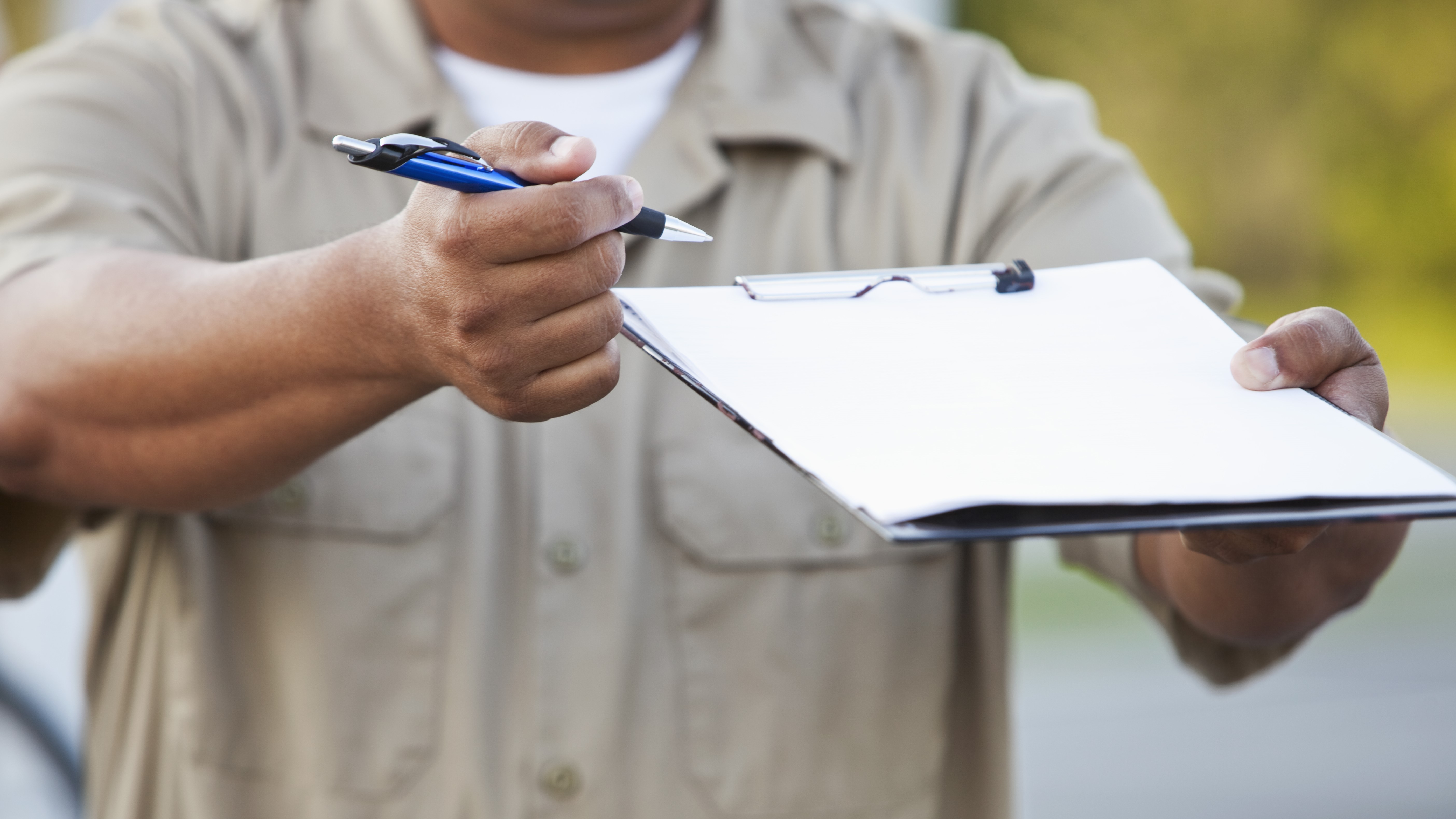 complete survey man holding clipboard