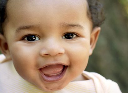Close up cute African American baby outdoors