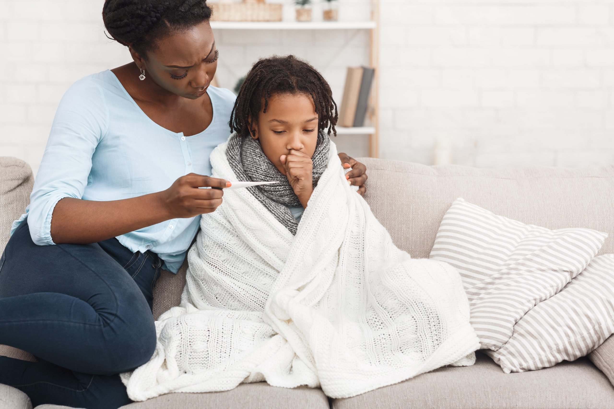 Decorative image of sick child with mother