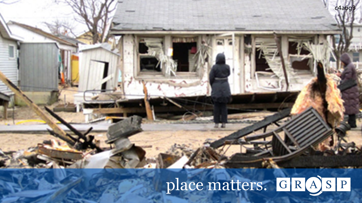 SVI-Home-v4a-t013-1200x675-c4a6g3 Image of person looking at a home impacted by a natural disaster