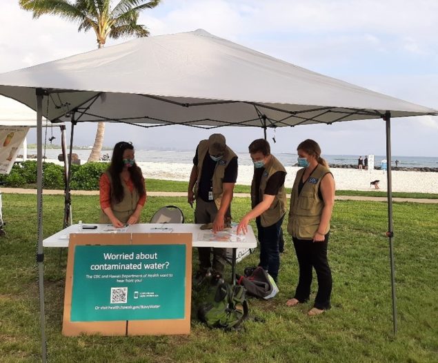 ATSDR Workers at an outdoor information booth in Hawaii.