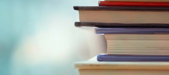 close up of a stack of books