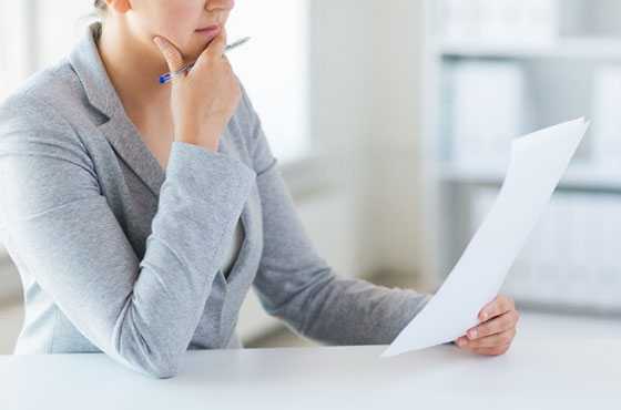 woman reading document